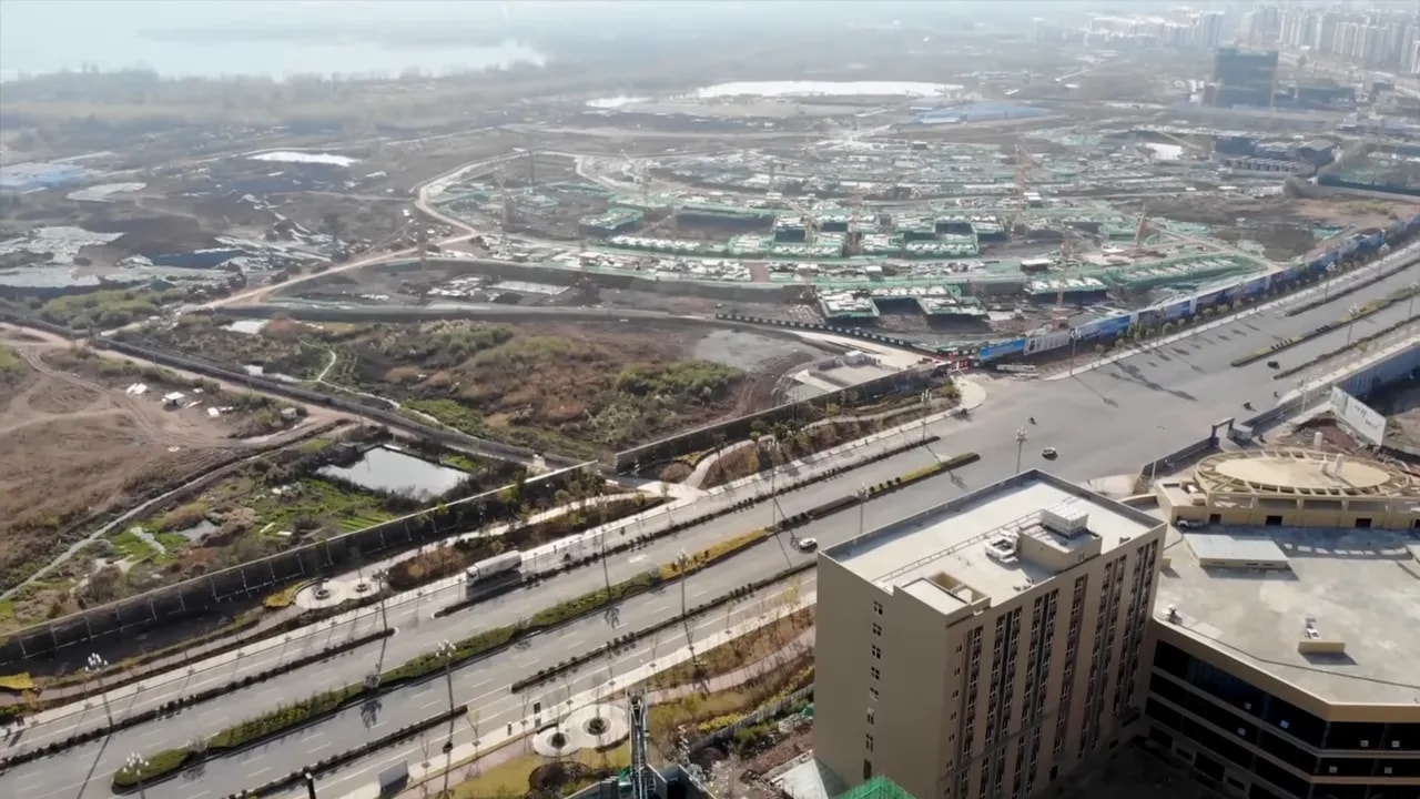 Aerial view of a residential district and apartment buildings near highways and waterways