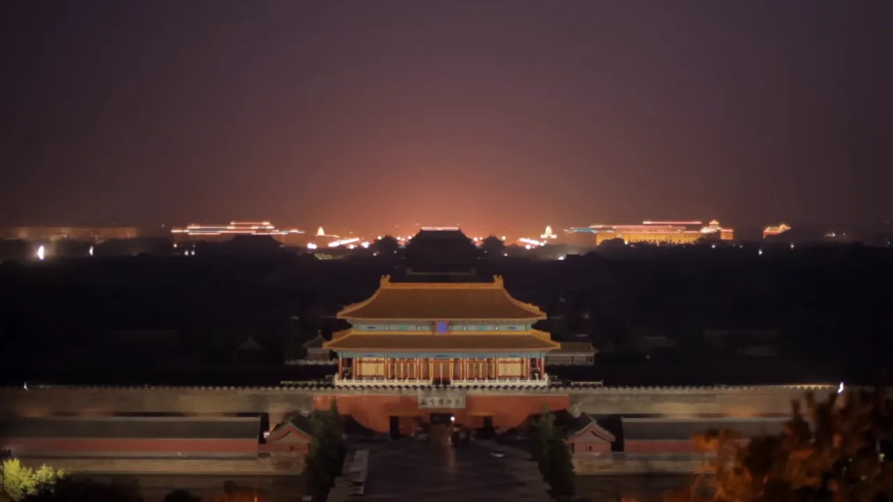 Beijing night skyline with palace-style landmark