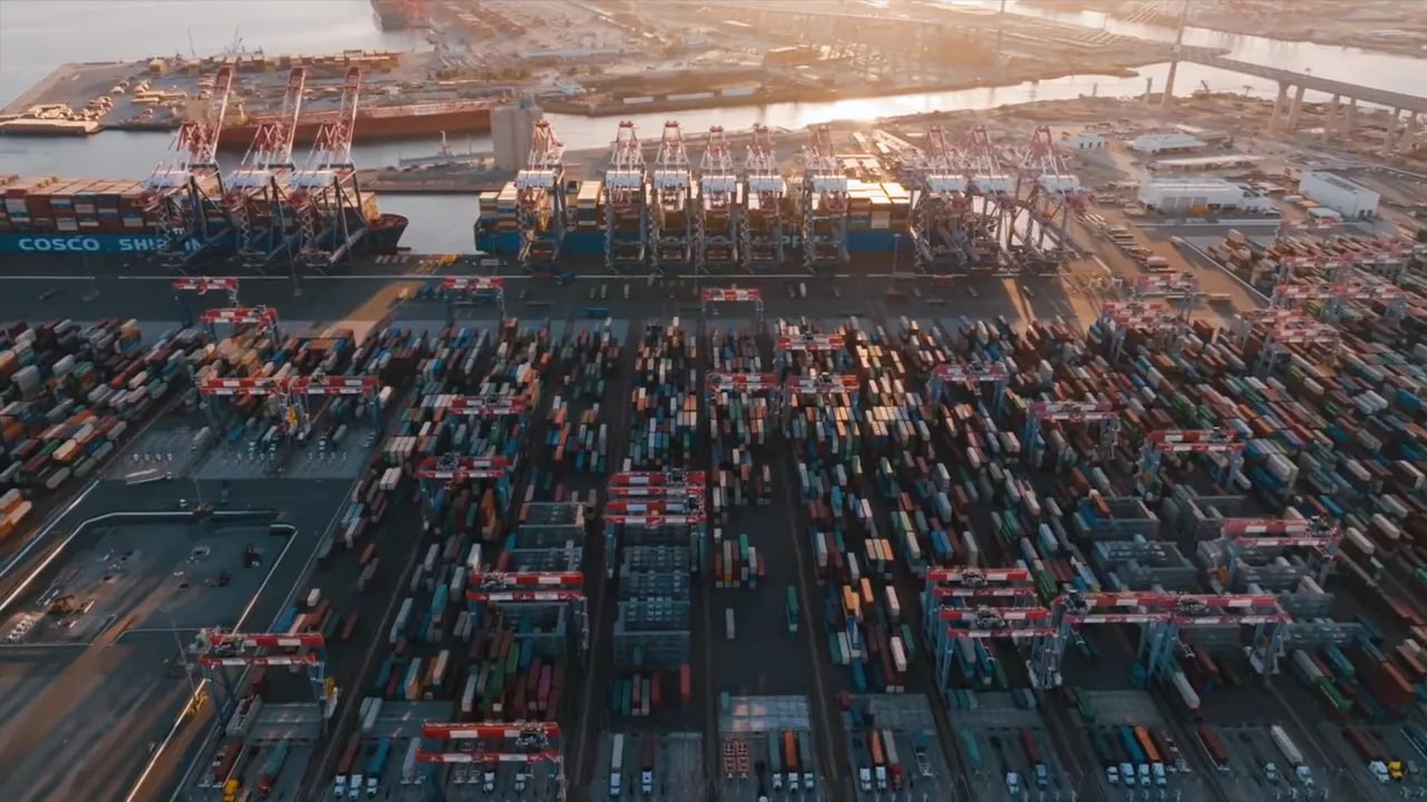 Aerial view of a Chinese container terminal with container cranes and cargo yards