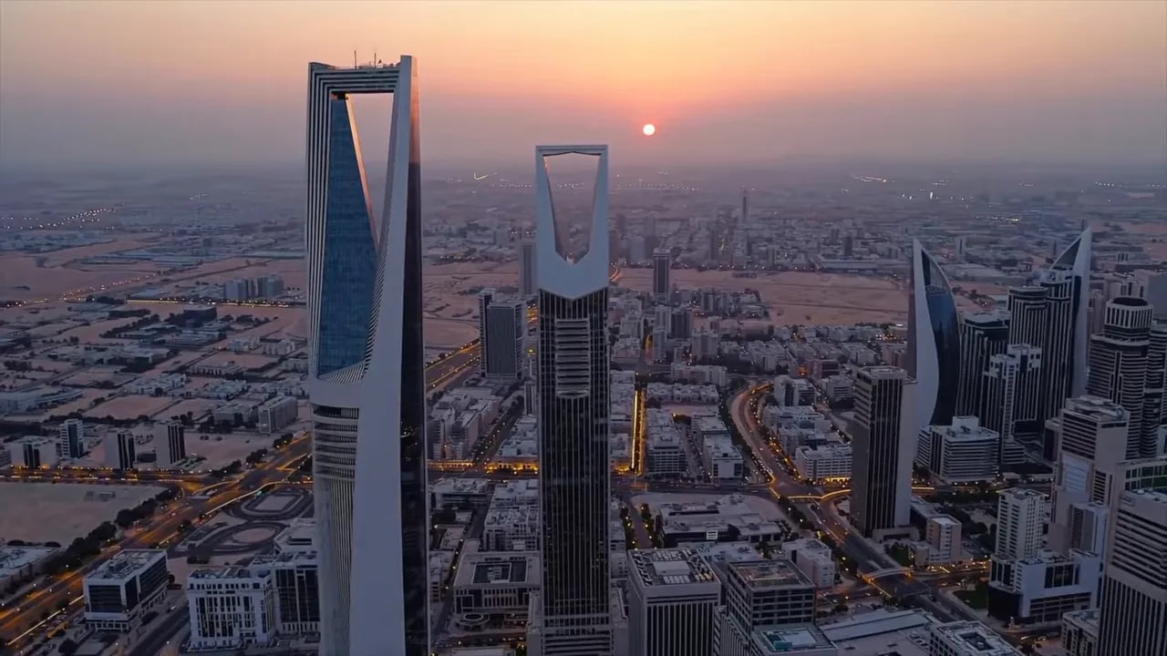 Aerial view at dusk of China’s downtown skyline with illuminated roads