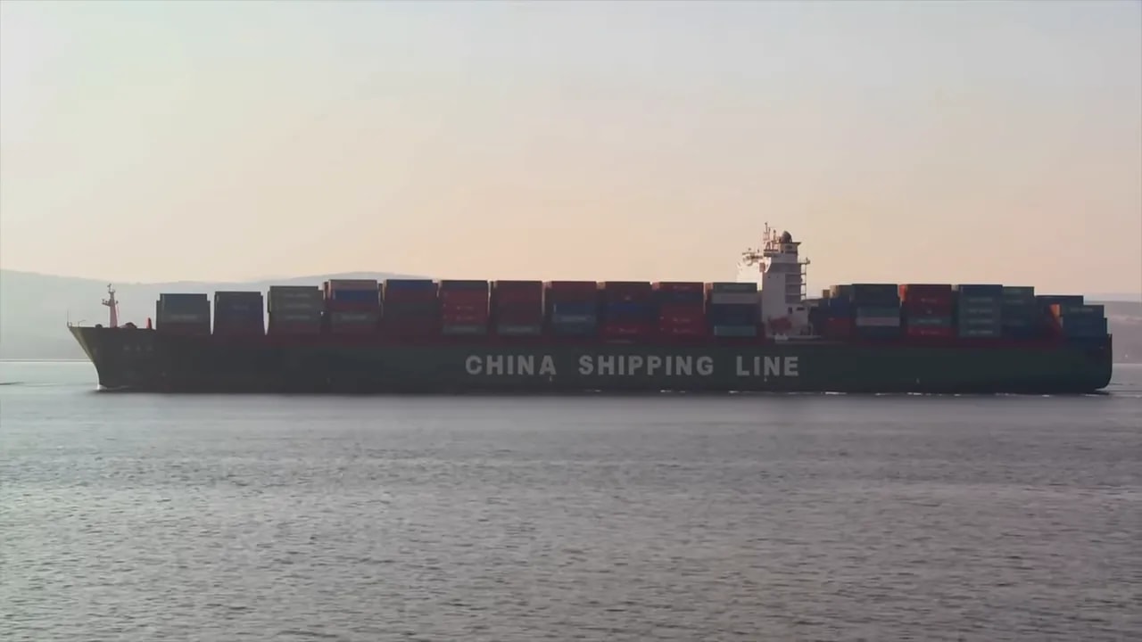 China Shipping Line container ship passing over calm waters