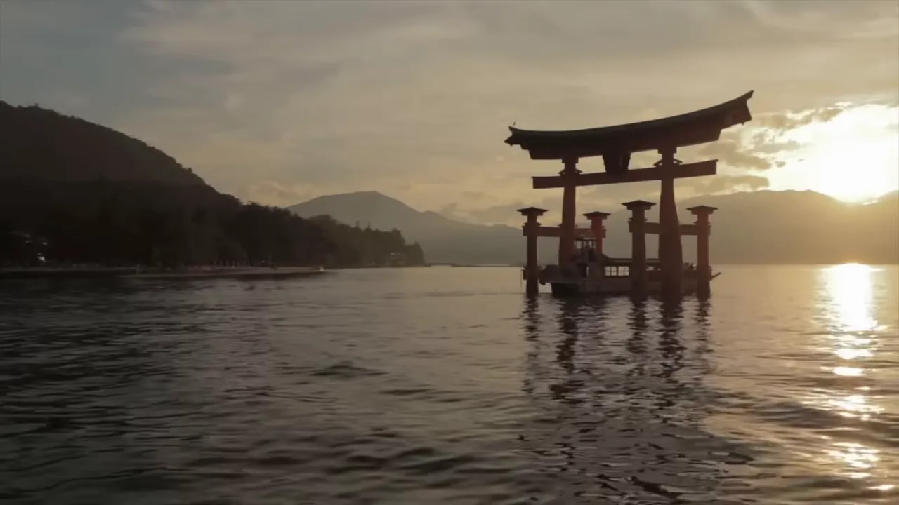 Torii gate on the water at sunset in Japan, symbolizing Japan’s security planning and southwestern islands