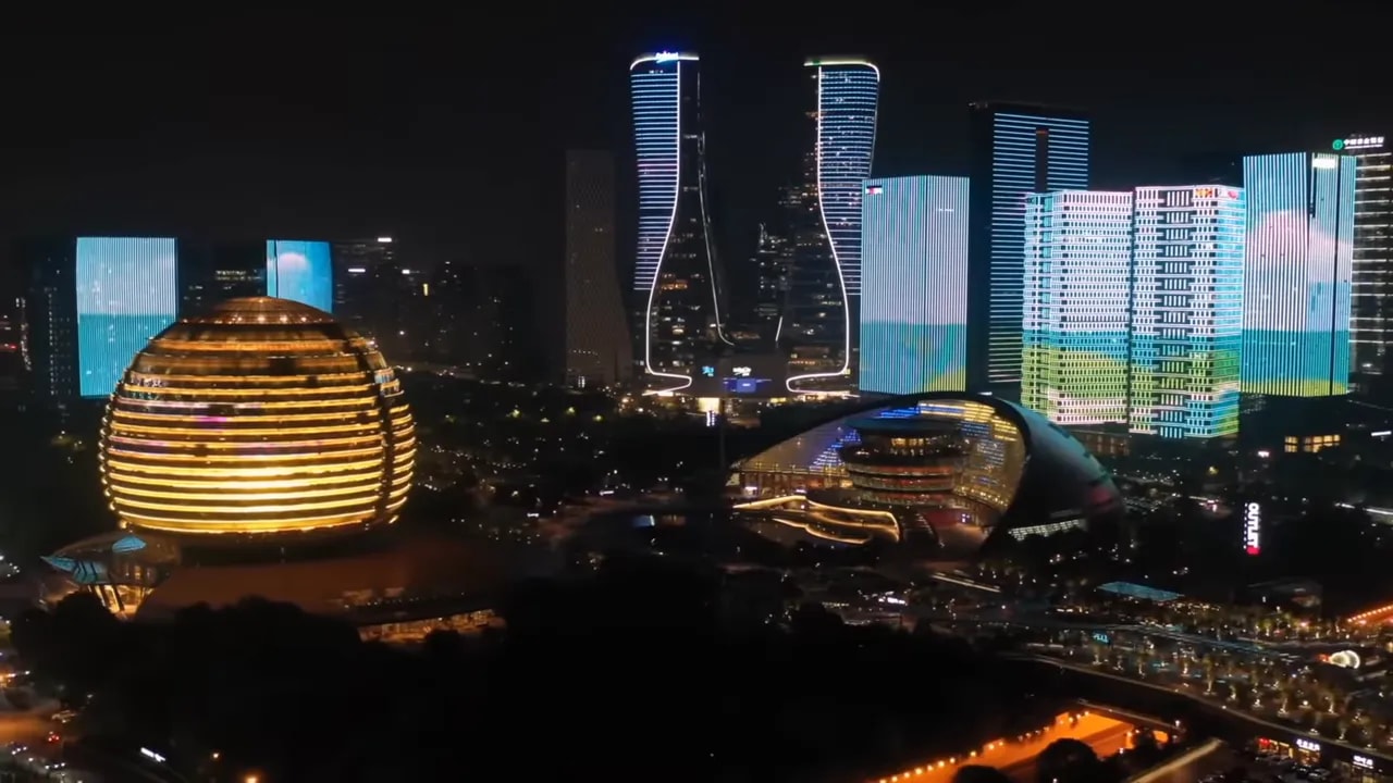 Clear nighttime skyline with modern skyscrapers and illuminated billboards in China