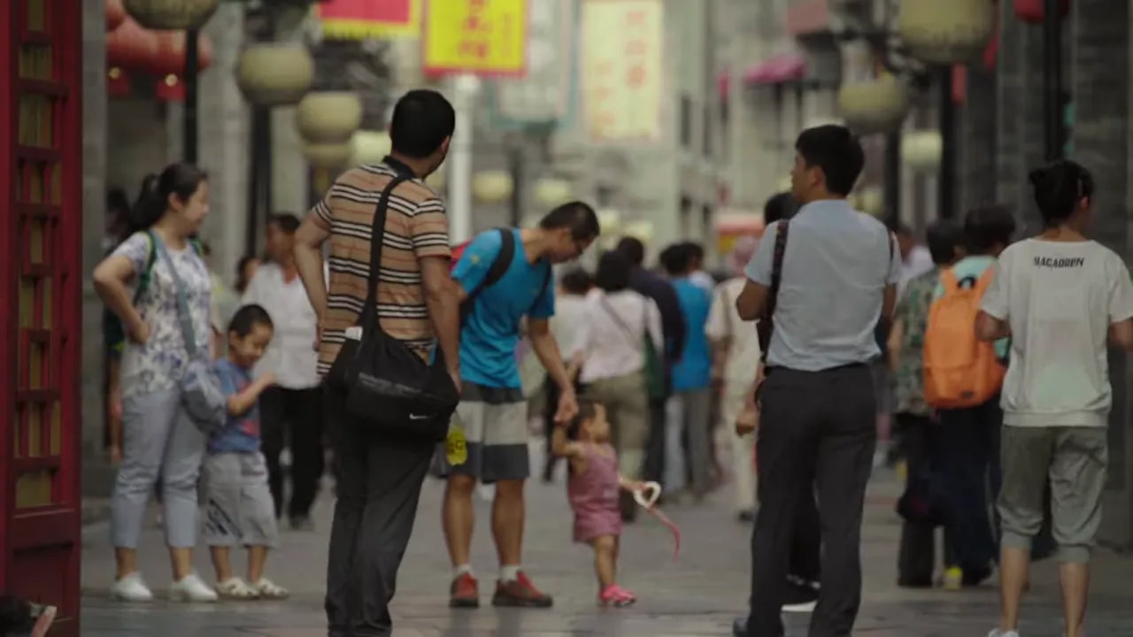Pedestrians walking on a street in China